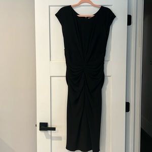 Christian Dior - Lined black cuffed shoulder sleeve dress. Size S. NWOT